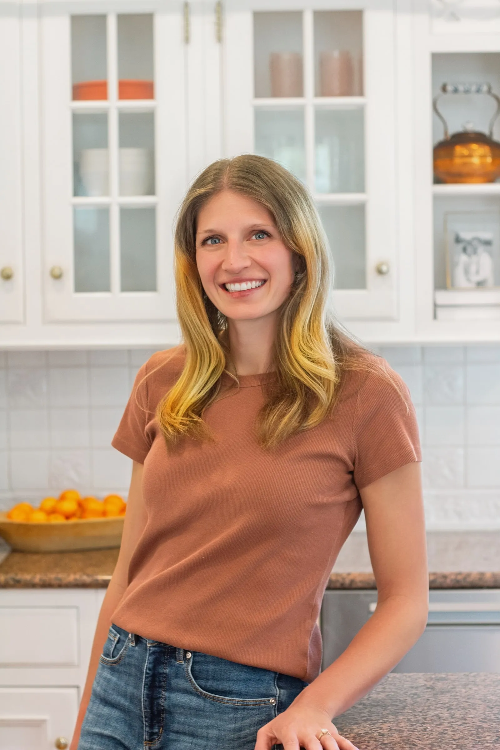 Kelsey Shaughnessy, RDN, smiling in a bright kitchen
